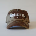"PRECIATE YA." Snapback Desert Camo/White