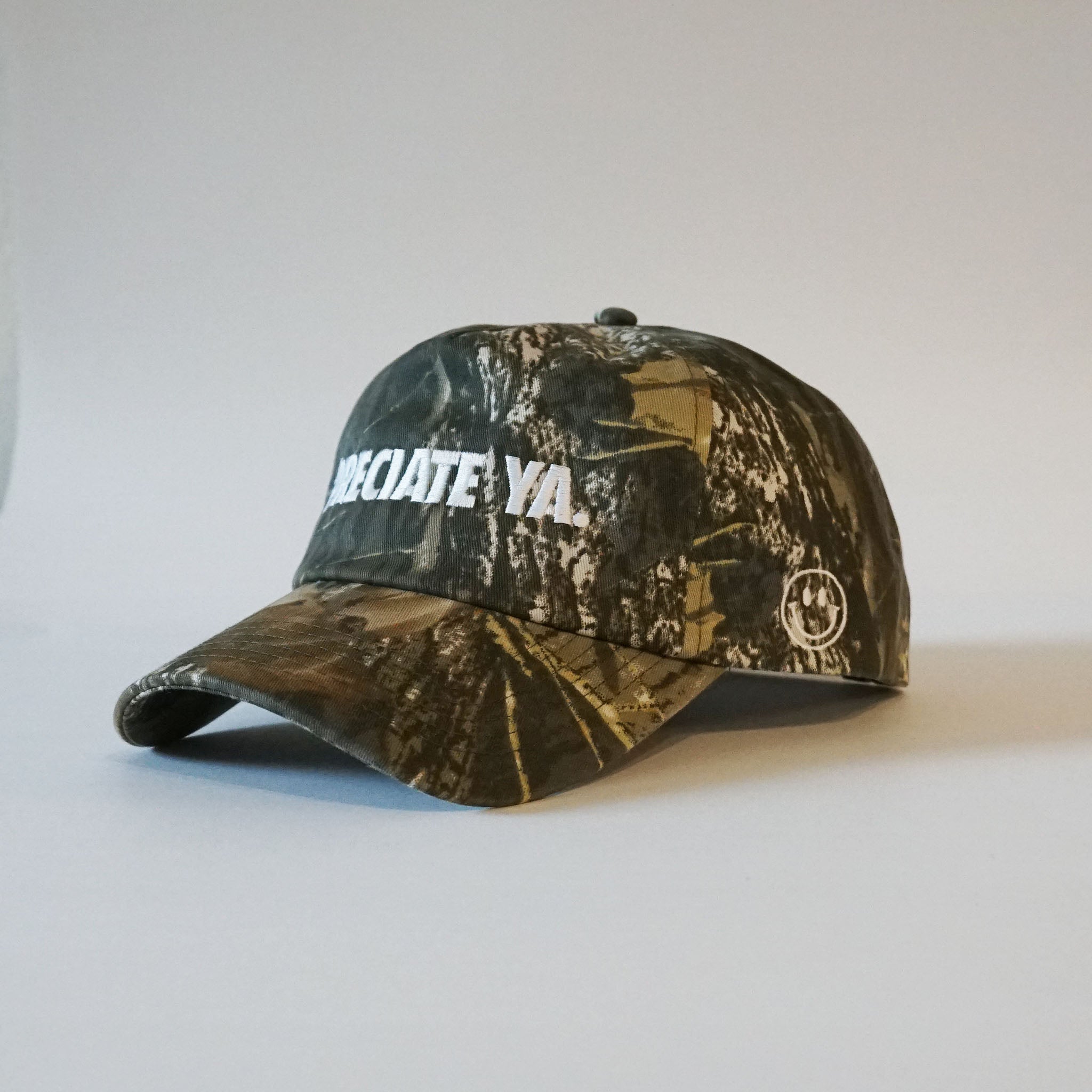 "PRECIATE YA." Snapback Camo/White
