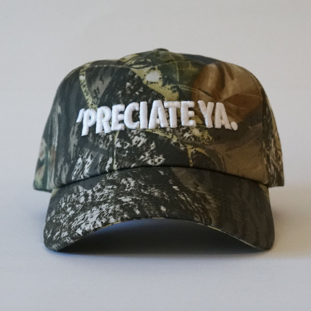 "PRECIATE YA." Snapback Tree Camo/White