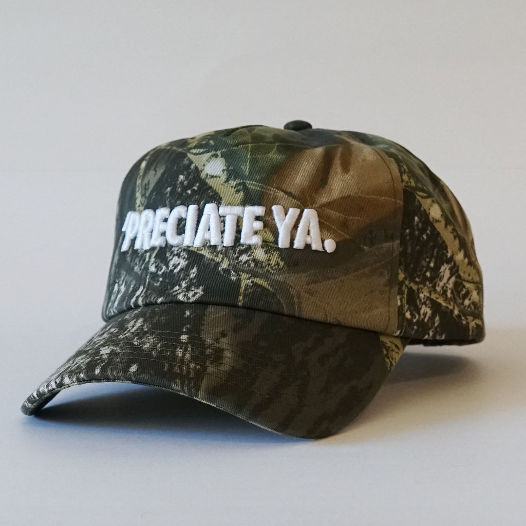 "PRECIATE YA." Snapback Tree Camo/White